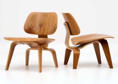 Circle Auction offering a pair of eames for herman miller LCW chairs